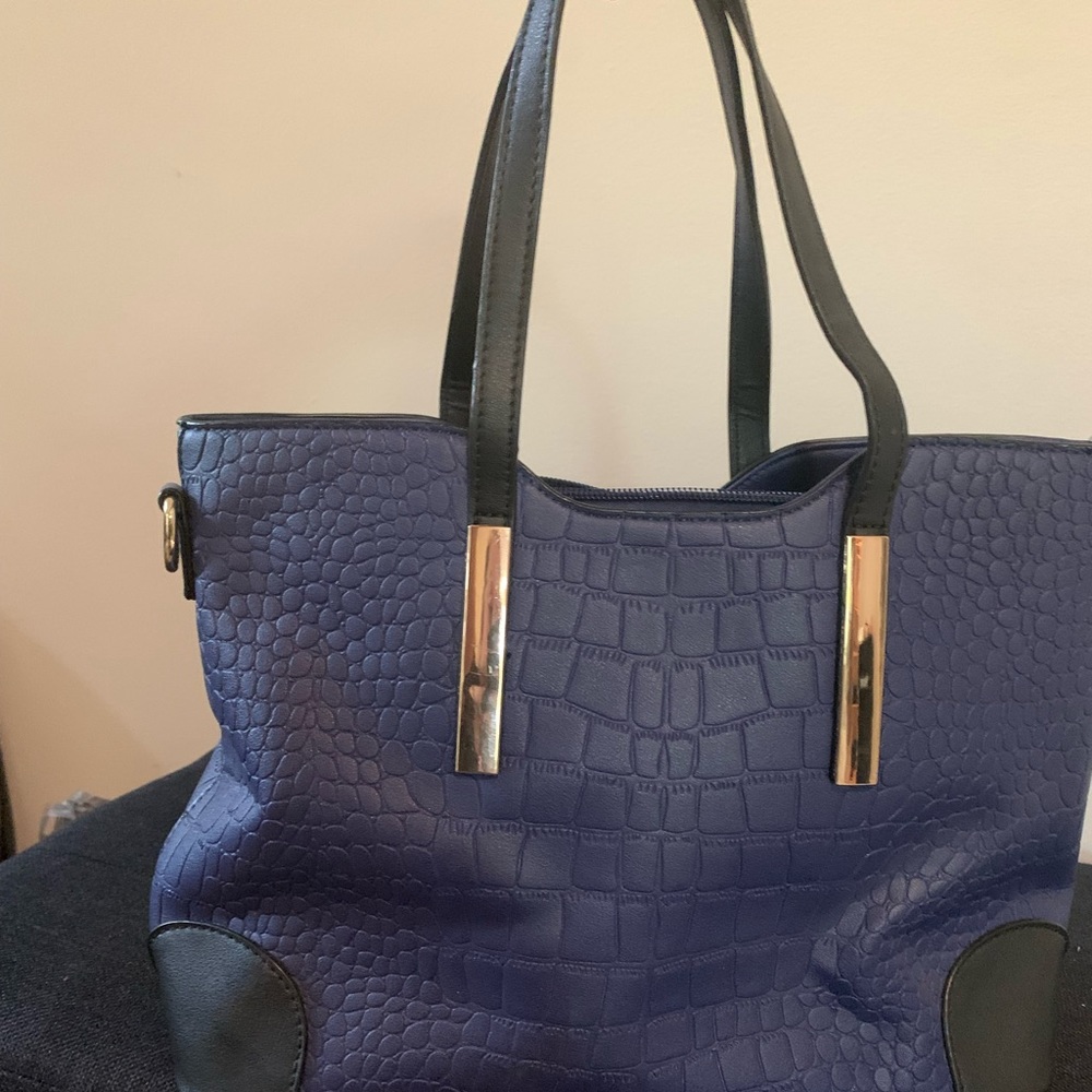 Blue and black purse